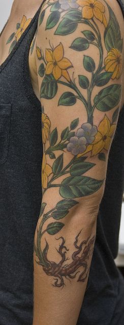 Gorgeous looking yellow tattoo