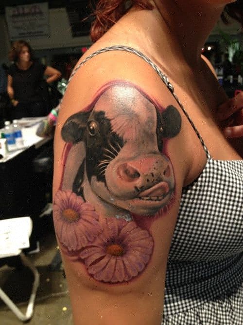 Great looking cow tattoo