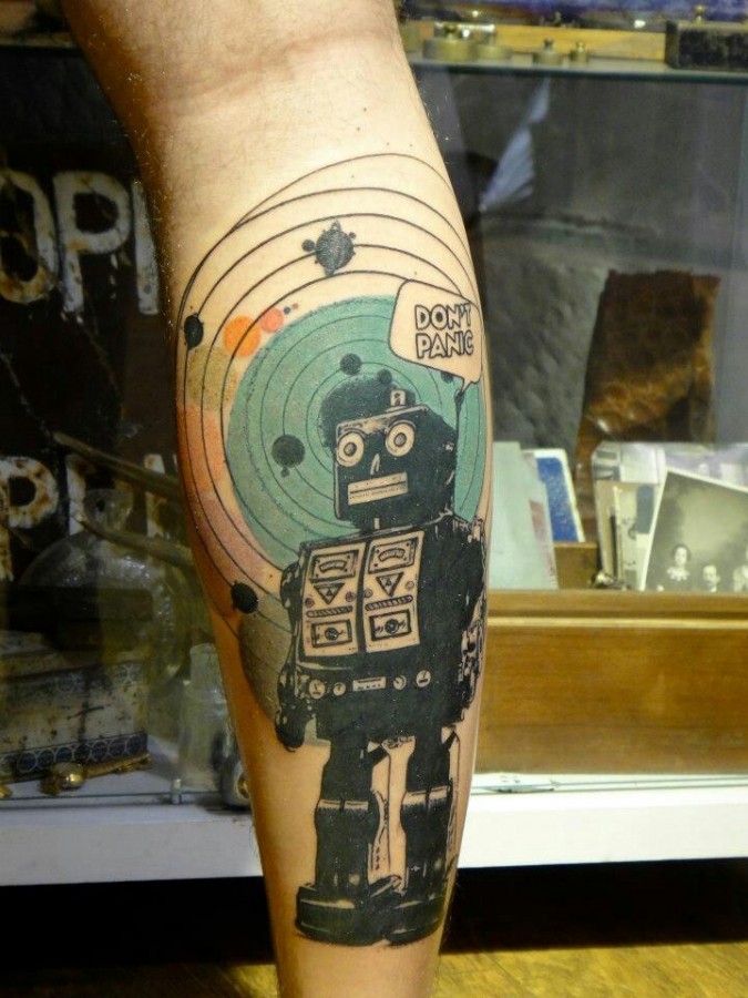 Green and don’t panic robbot tattoo