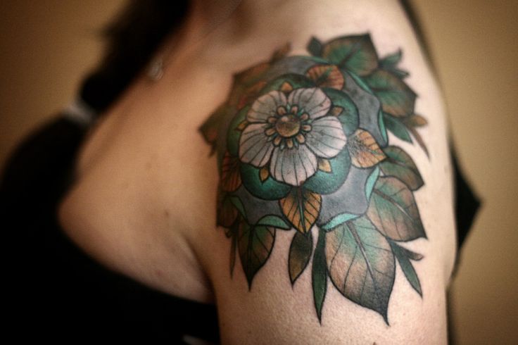 Green leafs flower geometric shoulder, back tattoo