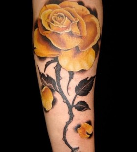 Green leafs rose yellow tattoo