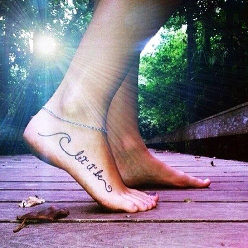 Let it be sun and girl tattoo on foot