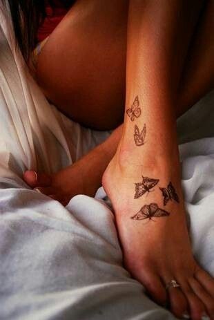 Lovely butterflies girl tattoo on foot