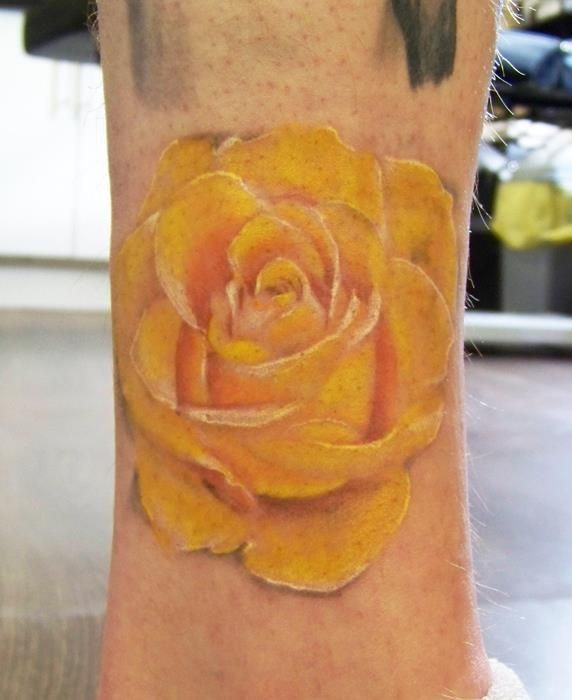 Lovely rose yellow tattoo