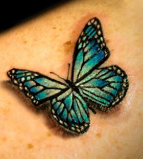 Lovely simple butterfly green tattoo