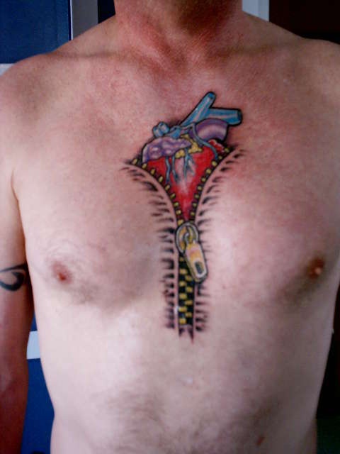 Men’s chest zip tattoo