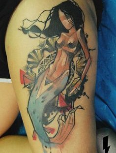 Ornaments style mermaid tattoo