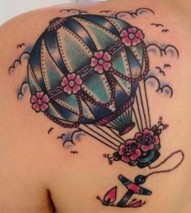 Pink and blue balloon tattoo