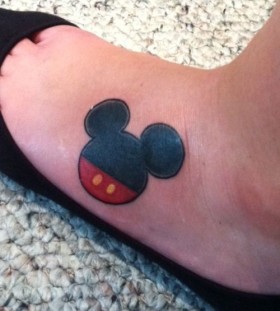 Red and black Mickey Mouse tattoo on leg