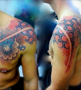 Red and black astro style geometric shoulder, back tattoo