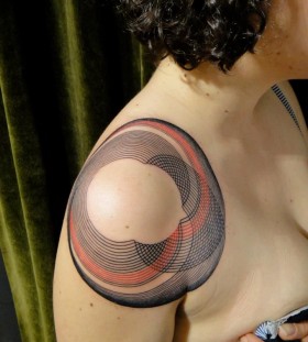 Red and black geometric shoulder, back tattoo