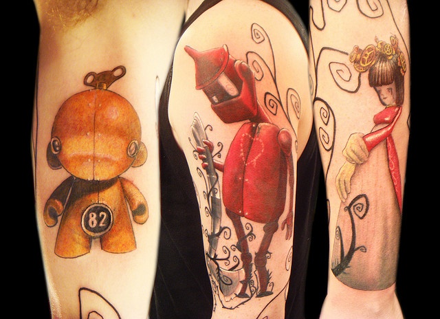 Red and yellow robbot tattoo