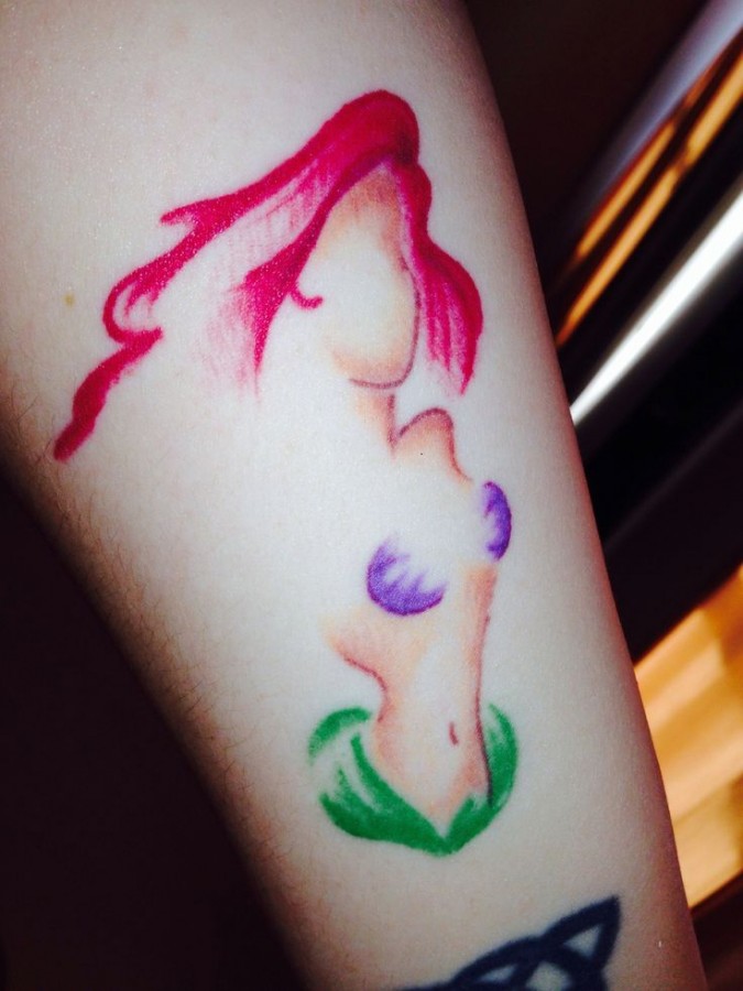 Red hair mermaid tattoo