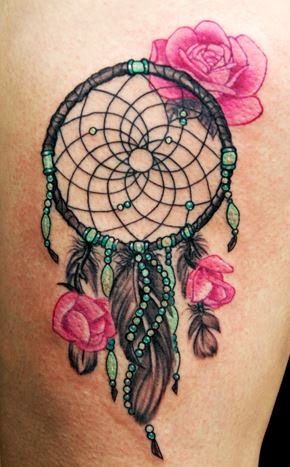 Red roses and dreamcatcher tattoo