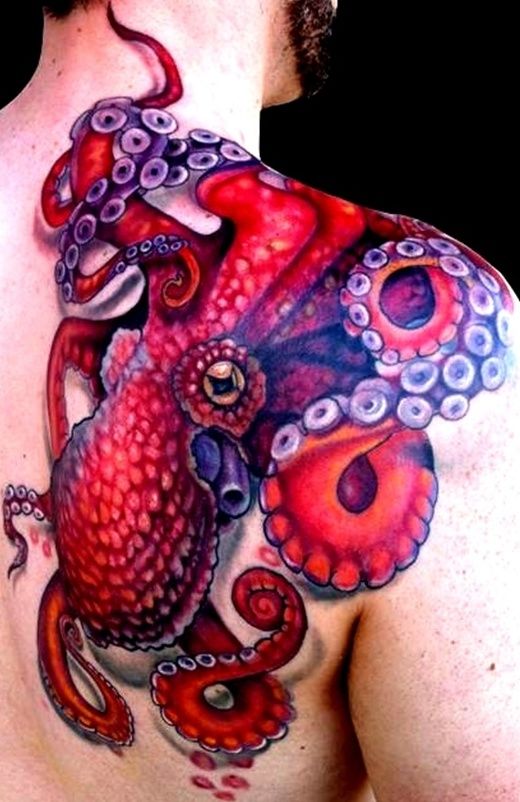 Red shoulder octopus tattoo on arm