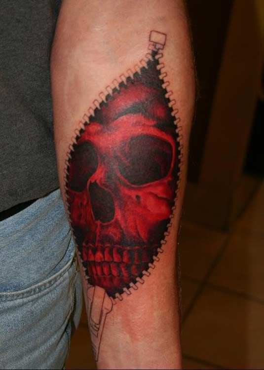 Red skull zip tattoo