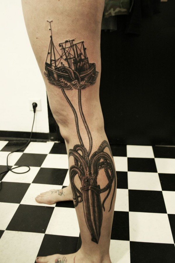 Ship black octopus tattoo on leg