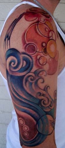 Shoulder wave and bubbles tattoo