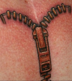 Small black zip tattoo