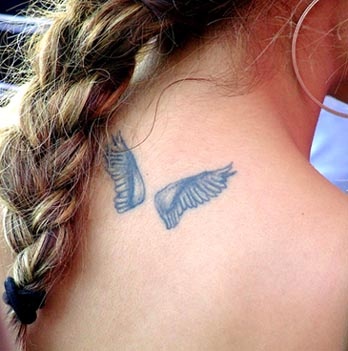 Small lovely angel tattoo on shoulder