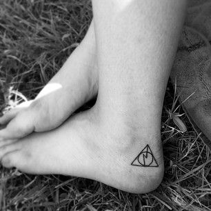 Stunning black Harry Potter tattoo