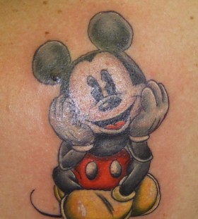 Traditional black Mickey Mouse tattoo on arm