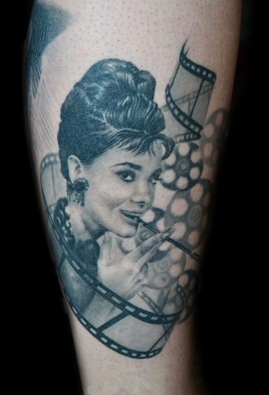 audrey with movie reels tattoo