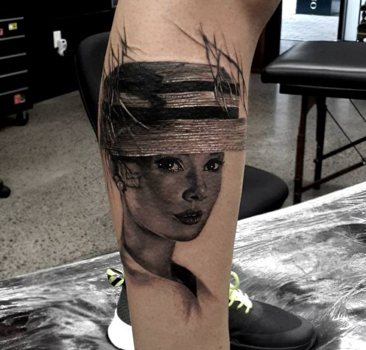 black and white audrey tattoo on leg