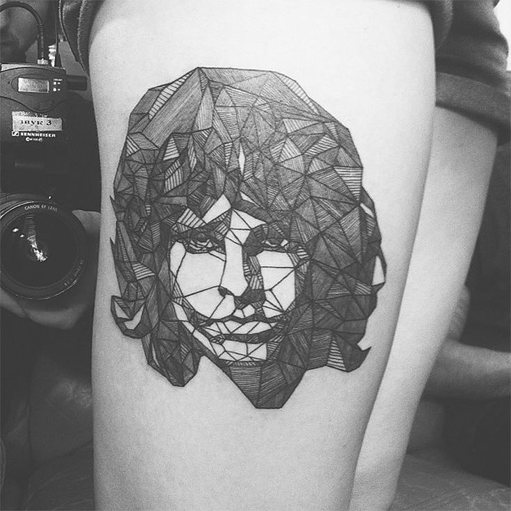 black and white jim morrison tattoo on leg