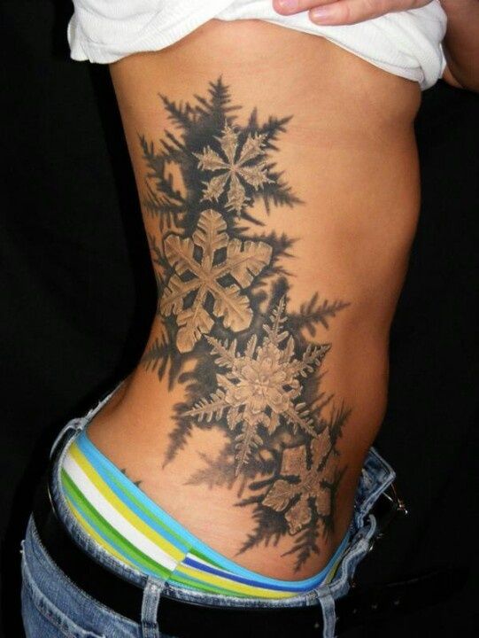 large black ans white snowflake tattoo