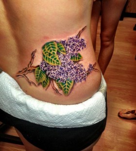 large lilac tattoo on the back