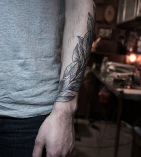 leaves tattoo on arm