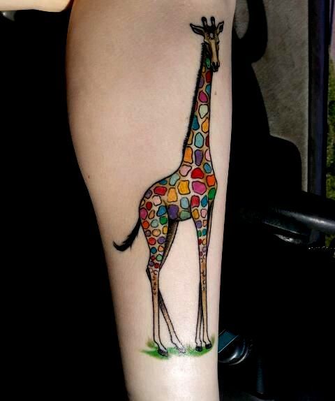 multicolor giraffe tattoo on leg