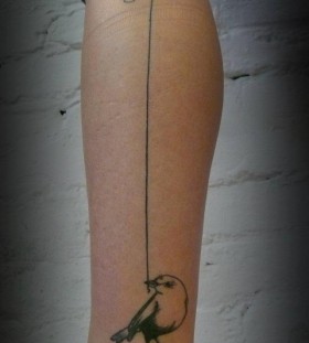 Adorable bird leg tattoo