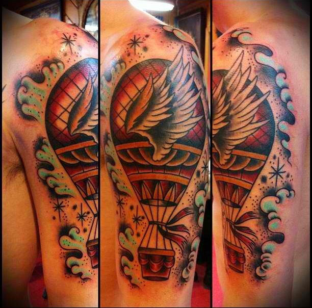 Air balloon with wings tattoo