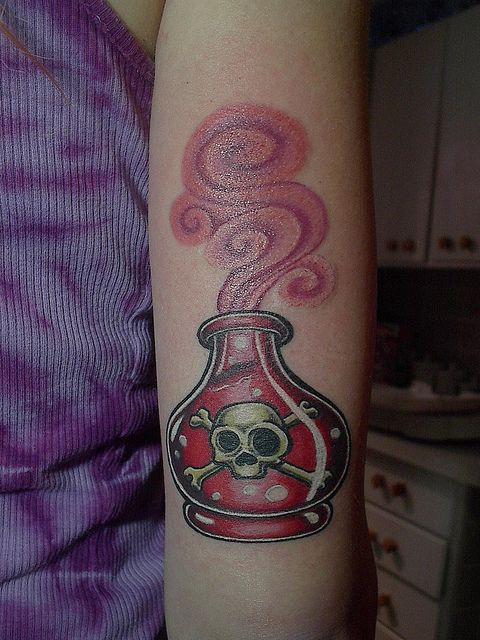 Amazing arm’s bottle tattoo