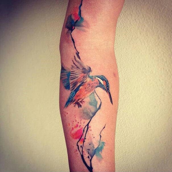 Amazing bird watercolor tattoo