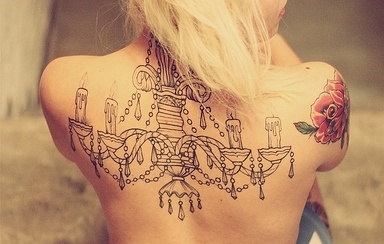 Amazing chandelier back tattoo