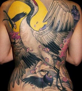 Amazing full back crane tattoo