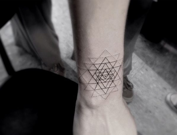 Amazing geometric tattoo by Dr Woo