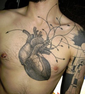 Amazing heart tattoo by Yann Black