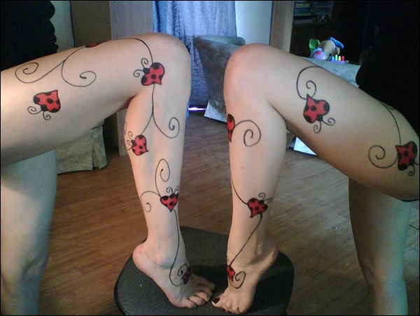 Amazing ladybug leg tattoo