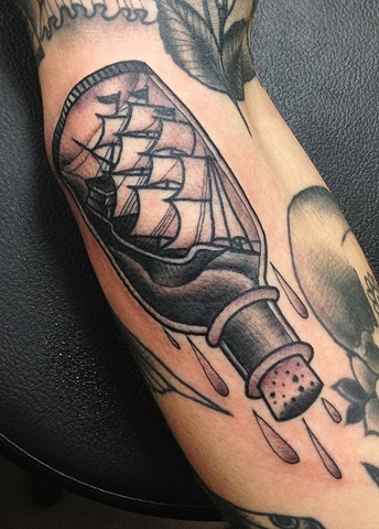 Amazing looking bottle tattoo