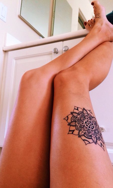 Amazing placement leg’s mandala tattoo