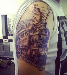 Amazing steaming train arm  tattoo