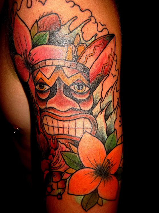 Amazing tiki arm tattoo