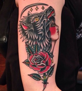 Amazing woman with wolf's head tattoo by Nick Oaks
