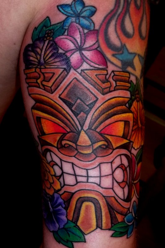 Angry tiki tattoo