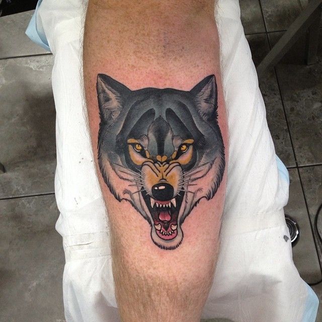 Angry wolf tattoo by Dan Molloy