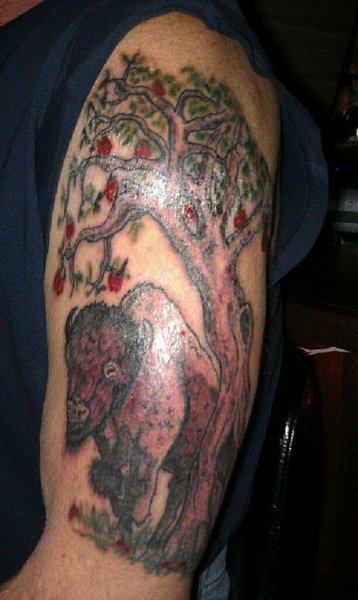 Apple tree and bison tattoo